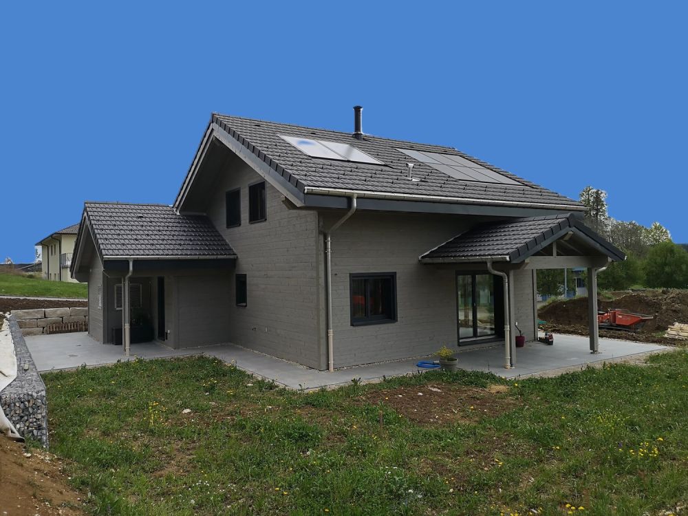 Maison moderne en madrier thermo-chauffé, avec garage, terrasse et jardin -  Bild 2