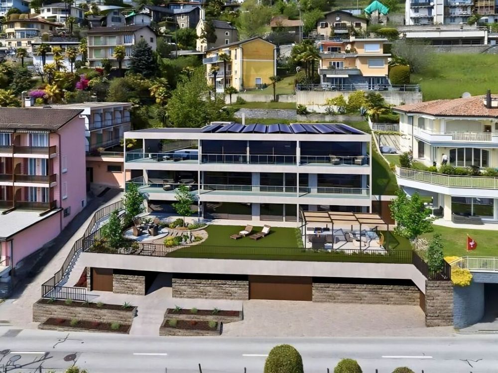 Moderno ed esclusivo attico di 4.5 locali con spettacolare vista lago, giardino e piscina privata -  Bild 9