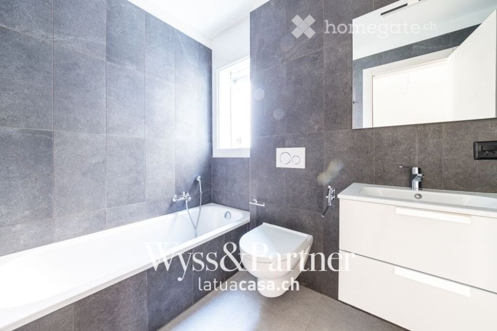 Claro - nuovo appartamento 3.5 con giardino - Bild 5