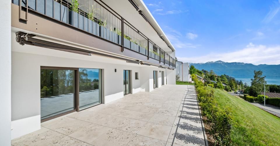 Neuf | Terrasse & jardin avec vue lac - Appartement 4.5 pièces - image - 11