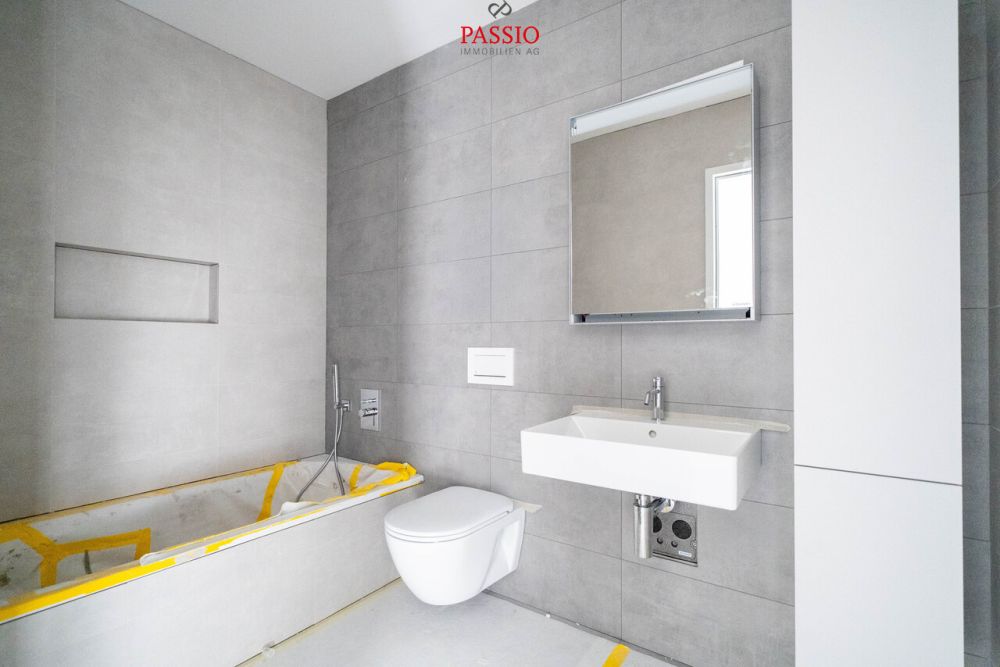 Lichtdurchflutete 4.5-Zimmer Neubauwohnung mit einmaliger Weitsicht - Bild 12