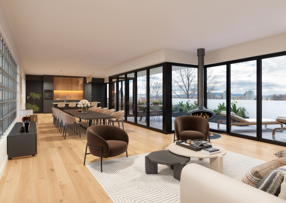 EXCLUSIVITE Appartement de standing dans un quartier prisé - La pièce à vivre avec cheminée / Der Wohnraum mit Kamin / The living room with fireplace