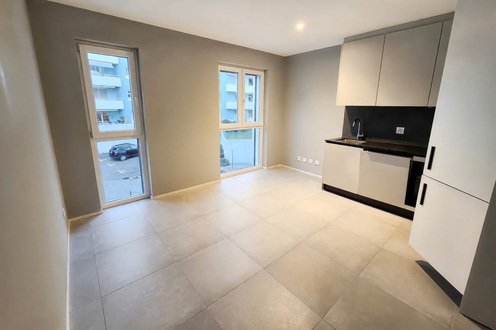 Nuovo appartamento 2,5 locali in stile moderno in posizione comoda -  Bild 1