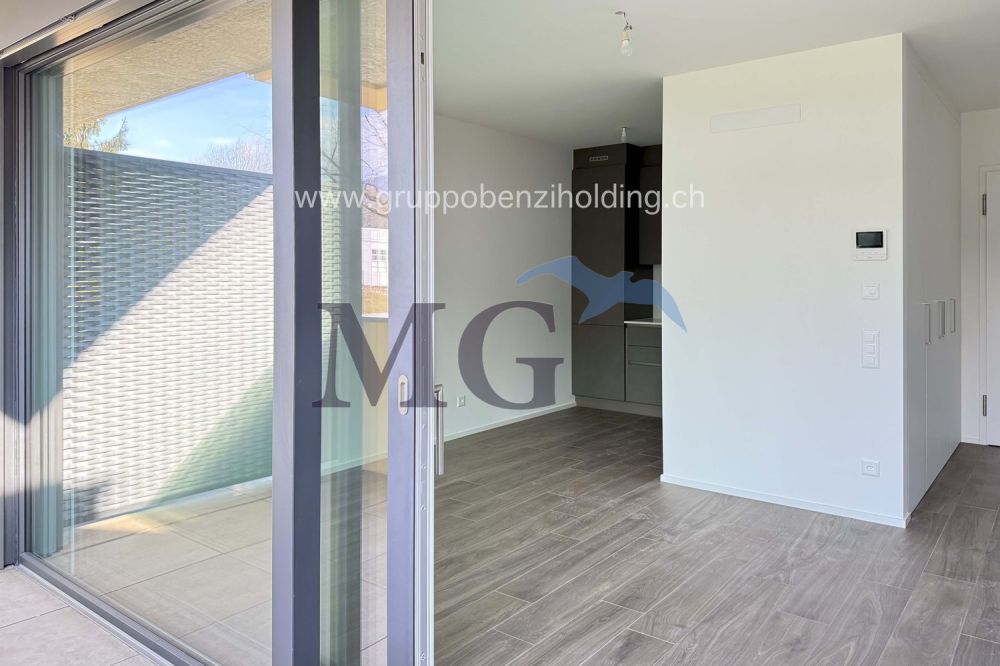 Moderno appartamento di 2.5 locali in zona residenziale - Bild 1