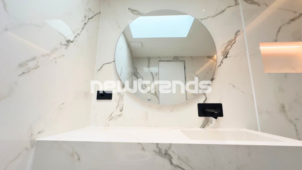 Viganello: 4,5 locali nuovi con vista aperta e parziale lago. - bagno camera padronale