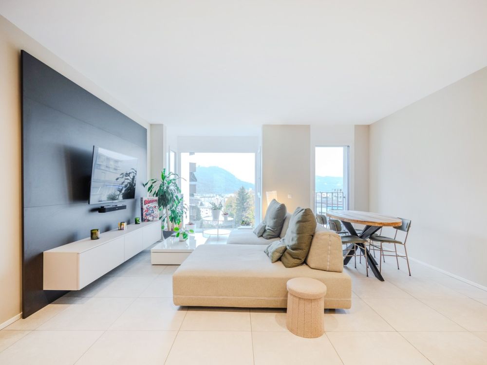 Moderno ultimo piano 3,5 di alto standing con terrazza panoramica. - Bild 1