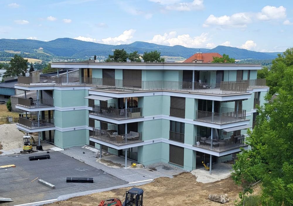 Attikawohnung mit viel Privatsphäre, Blick ins Grüne und 97 m² Terrasse -  Bild 1