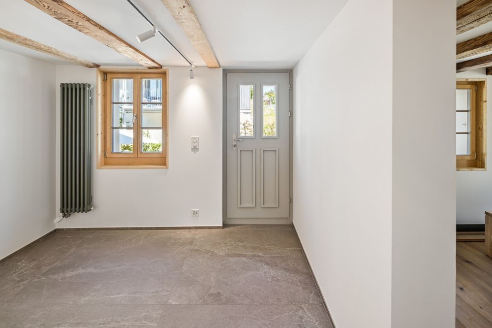 Letzte Gelegenheit: Einzigartige 7.5-Zimmer-Bauernhaushälfte - Hintereingang