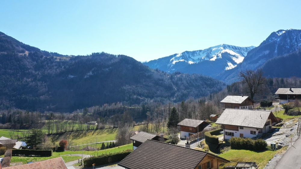 Magnifique chalet neuf de 4,5 pièces avec vue panoramique sur les montagnes - Bild 13
