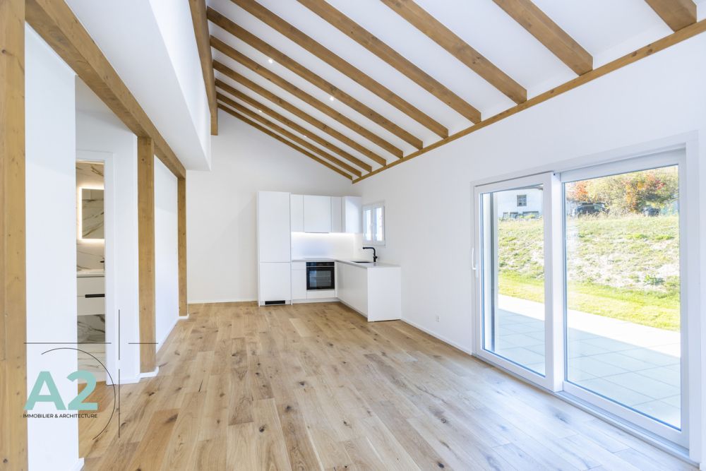 Appartement 3,5 pièces neuf, exposé nord-est avec jardin - Bild 1