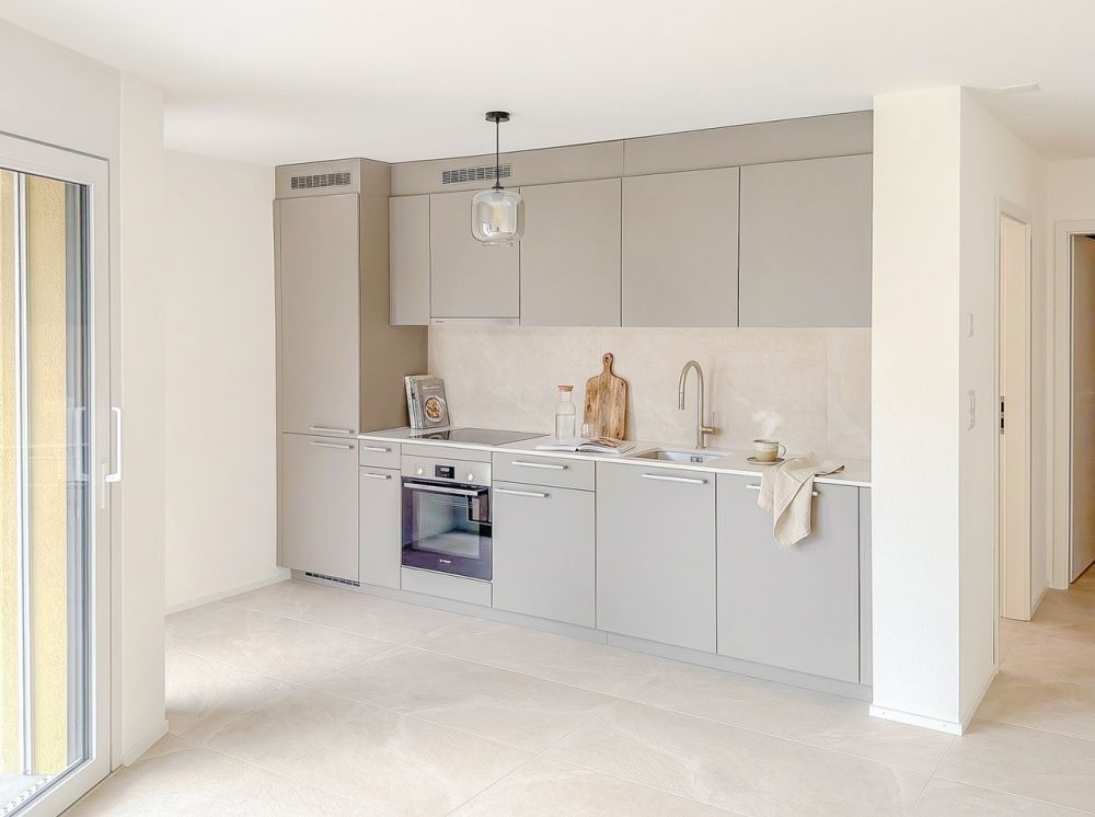 Appt PPE neu von 2,5 Zimmern mit Balkon Campagne Pernod, Los B7 - Cuisine agencée ouverte (image de synthèse)