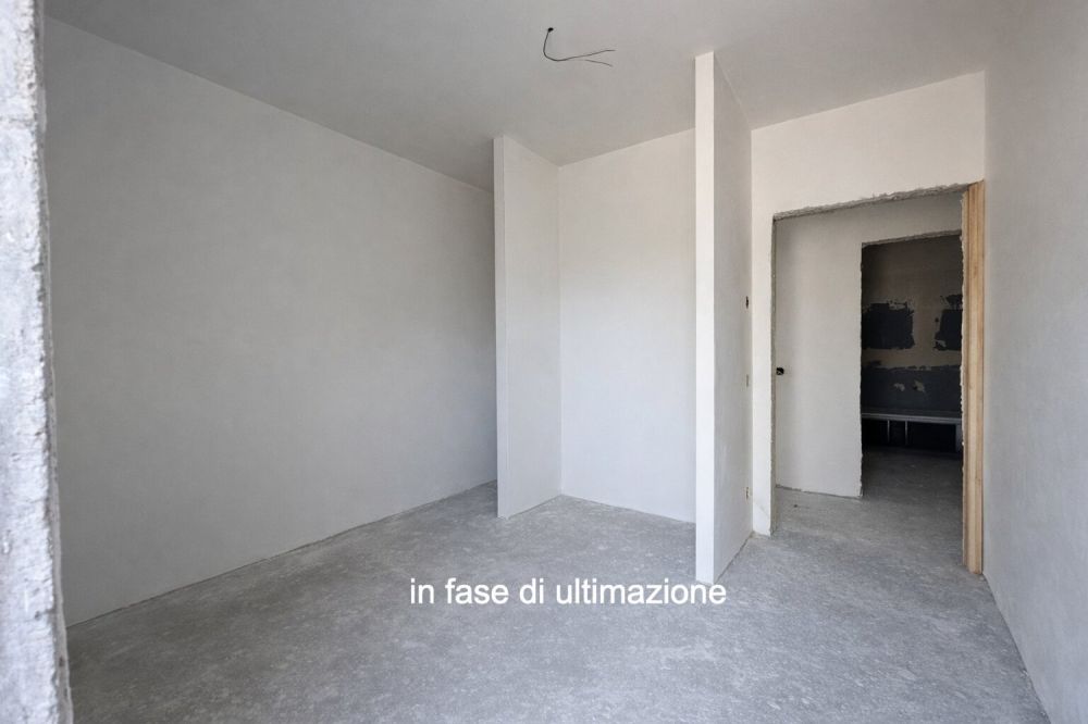 Moderno e nuovo 3.5 locali duplex con giardino a Melano -  Bild 3