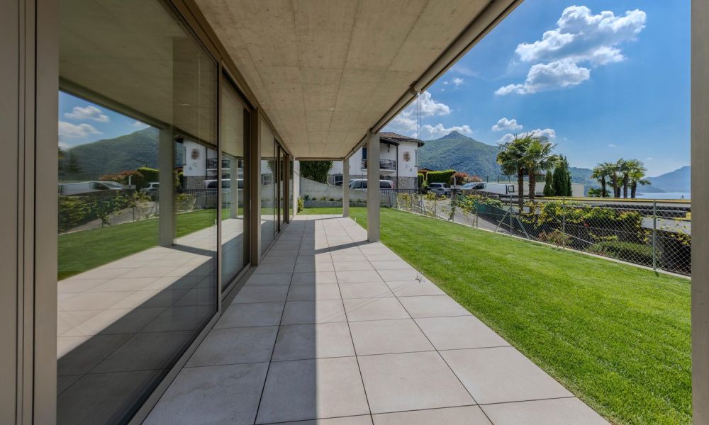 STUPENDO E MODERNO 2.5 CON GIARDINO E VISTA LAGO A BISSONE -  Bild 8