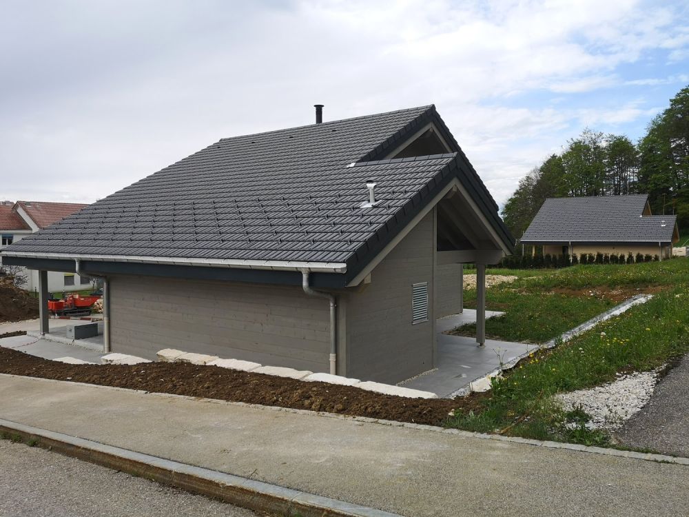 Maison moderne en madrier thermo-chauffé, avec garage, terrasse et jardin -  Bild 4