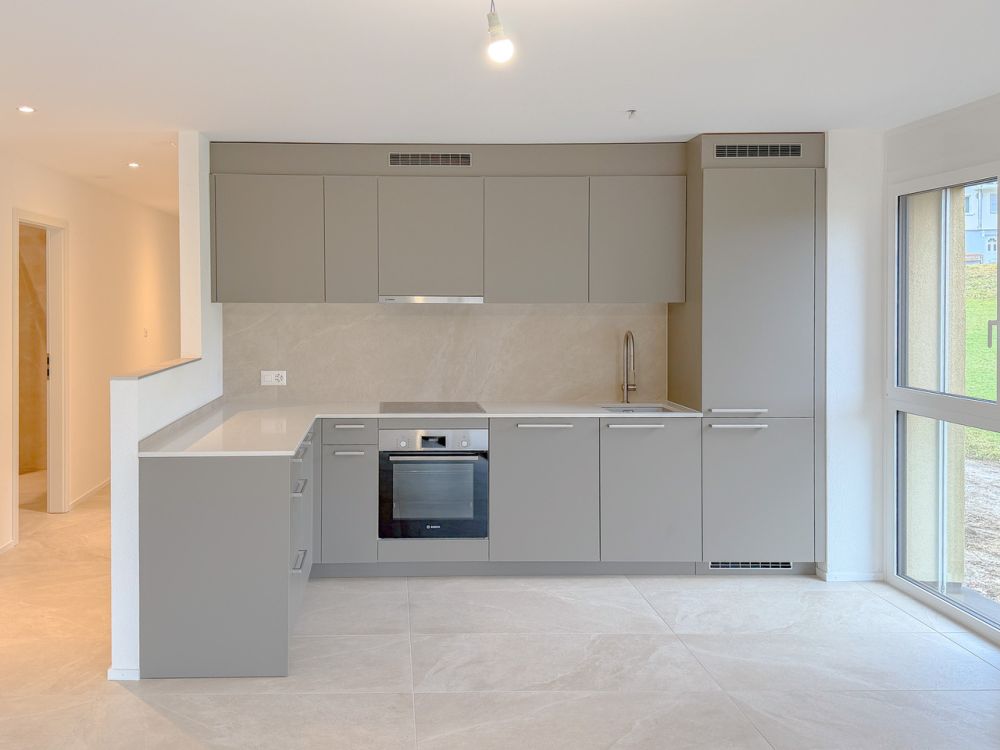 Appt PPE neu von 4.5 Zimmern mit Balkon Campagne Pernod, Los B6 - Cuisine ouverte entièrement agencée