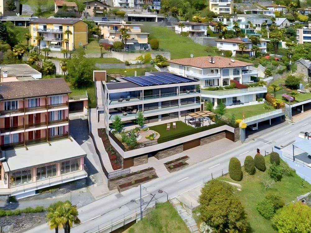 Moderno ed esclusivo attico di 4.5 locali con spettacolare vista lago, giardino e piscina privata -  Bild 10