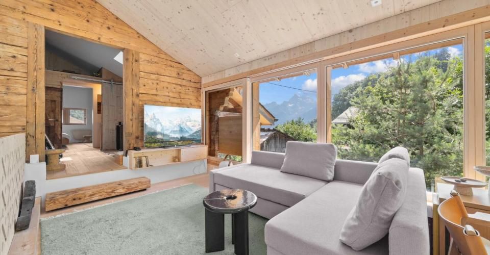 Un chalet d'exception entre plaine et montagne, au coeur de la commune - Maison 4.5 pièces - image - 12
