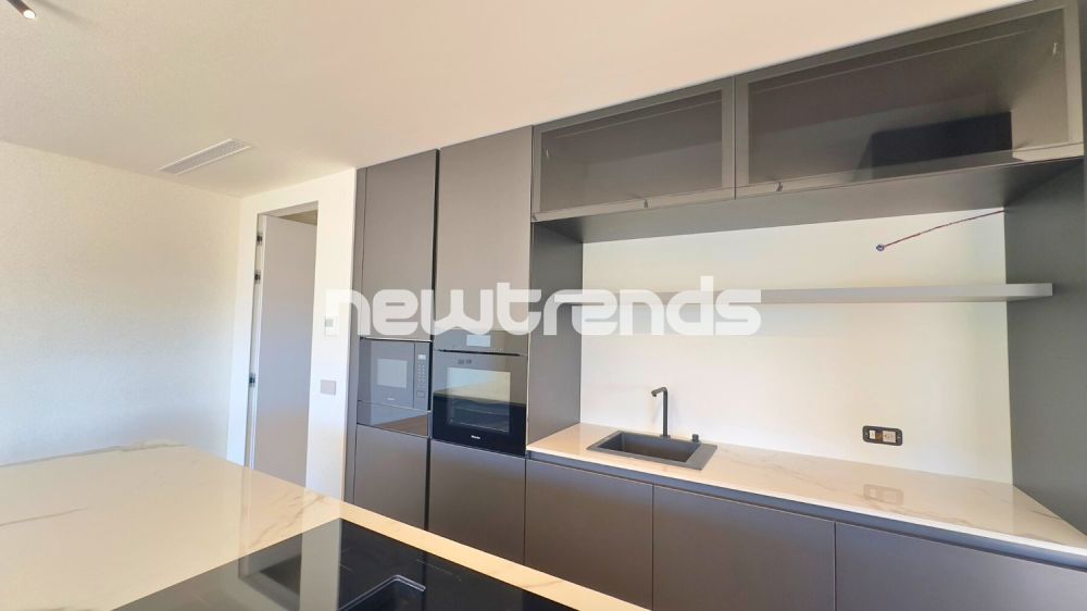 Viganello: 4,5 locali nuovi con vista aperta e parziale lago. - dettagli cucina