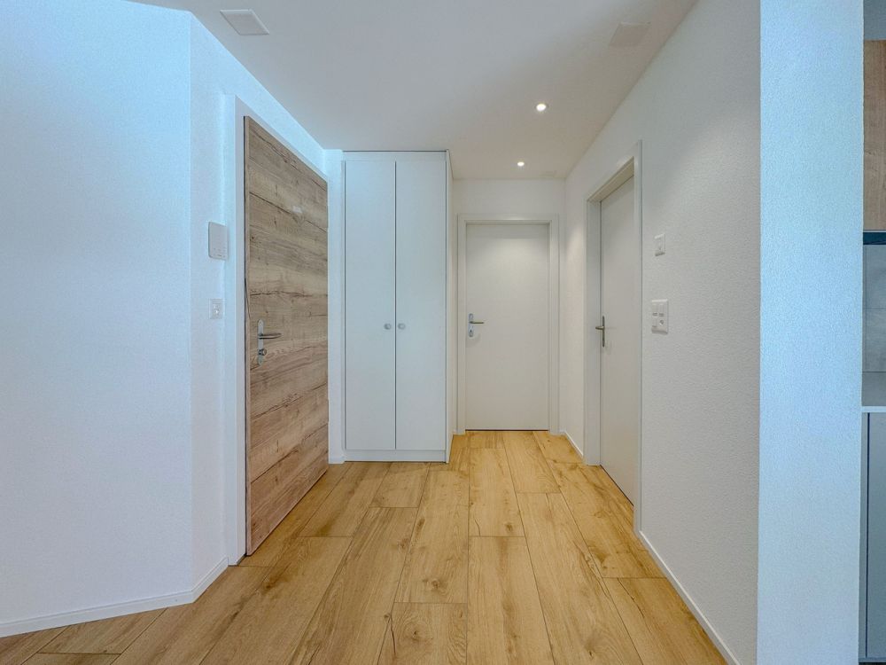 Appt PPE neuf de 2.5 pces avec balcon Campagne Pernod, lot A4 - Hall d'entrée avec armoires