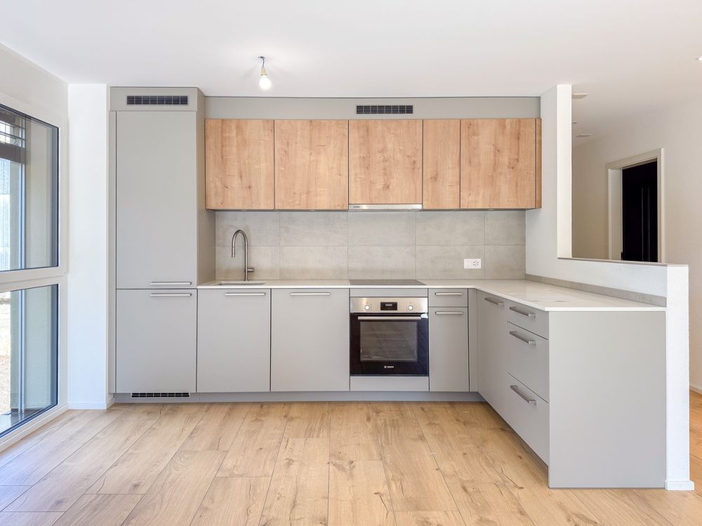 Appt PPE neuf de 4.5 pces avec balcon Campagne Pernod, lot A6 - Cuisine agencée ouverte