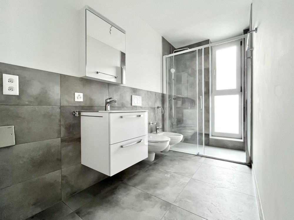 NUOVO ATTICO 2.5 LOCALI CON TERRAZZA A TESSERETE - Bild 7