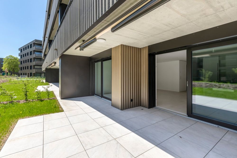 Magnifique appartement de 3,5 pièces au rez-de-chaussée avec terrasse - Bild 1