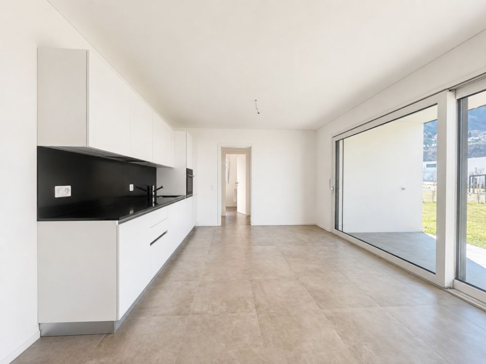 Ultimo appartamento di 2,5 locali con giardino privato -  Bild 1