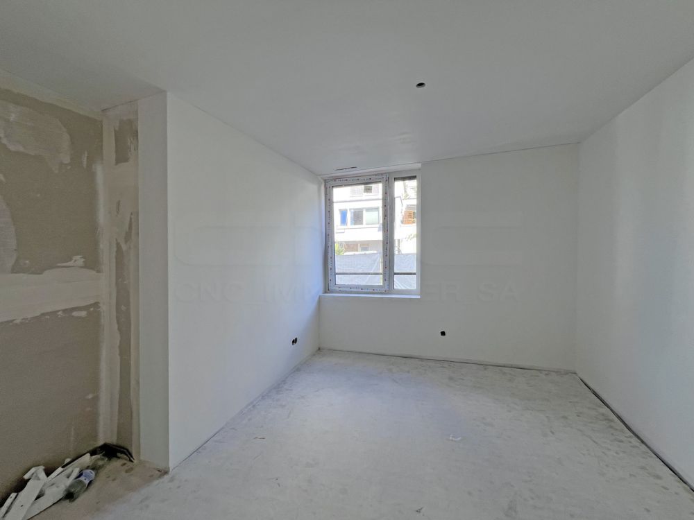 Wohnung 4.5 Zimmer mit architektonischer Eleganz, 2 Schritte vom Stadtzentrum entfernt - Lot 3 - Chambre à coucher