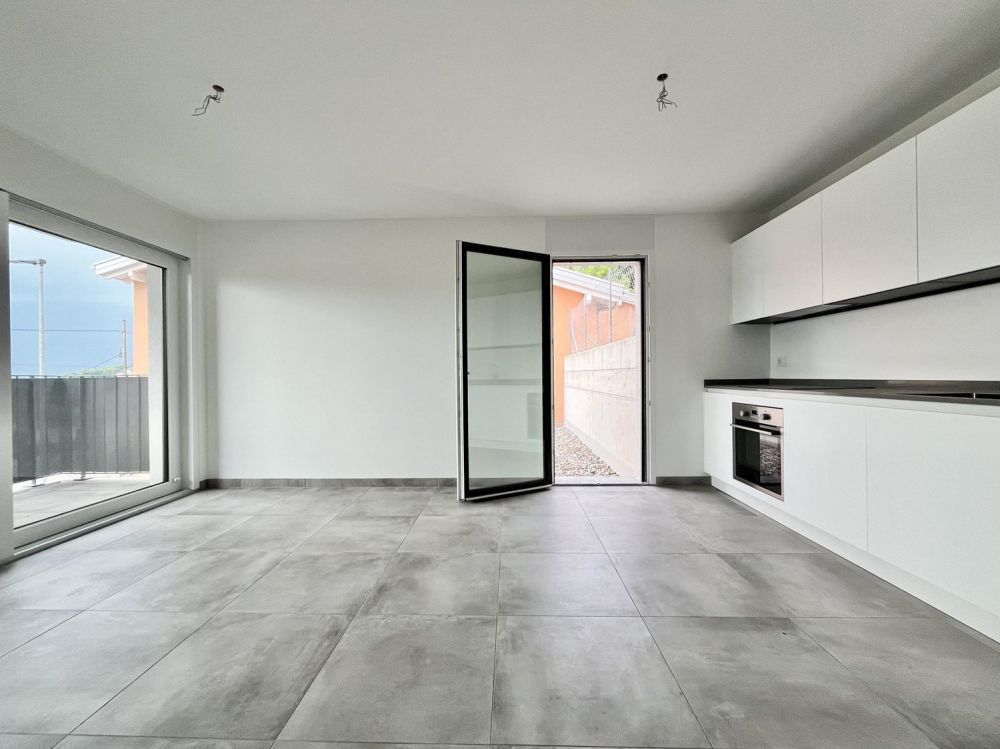 NUOVO APPARTAMENTO 2.5 AL 1P CON DUE TERRAZZE A TESSERETE - Bild 1