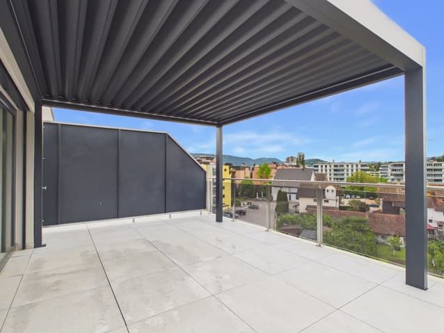 Stilvolle Attikawohnung mit grosser Terrasse und exklusiver Wohnkomfort in Delém -  Bild 1