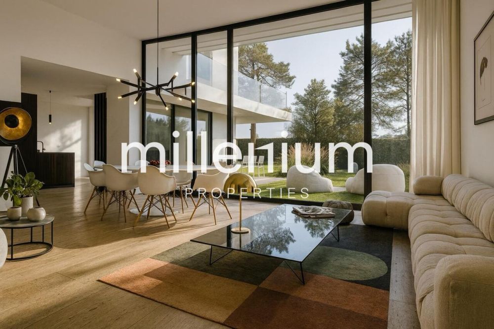 Villa contemporaine neuve à 100 m du Lac à Vésenaz - maison moderne avec de grandes fenêtres et des meubles blancs dans le salon / modern home with large windows and white furniture in the living room