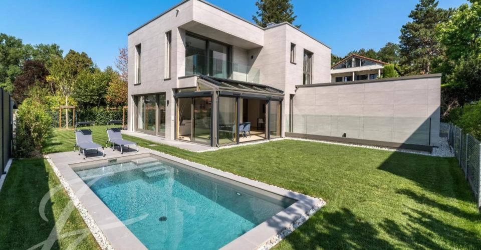 Une signature contemporaine au coeur de la rive gauche genevoise - Maison 8 pièces - image - 1