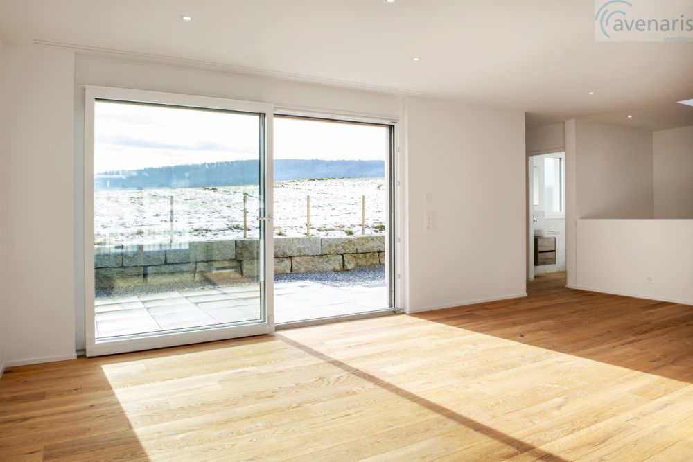 Neubau: Ein Doppeleinfamilienhaus ist noch frei - Wohnzimmer