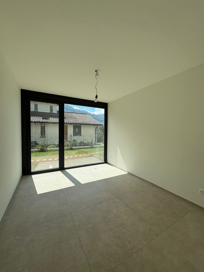 Elegante appartamento di 4.5 locali con giardino privato a Giubiasco -  Bild 9