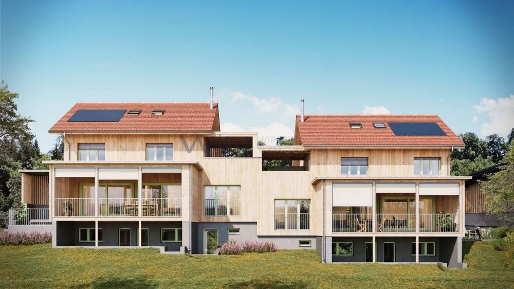Massivholz-Neubau mit Blick auf den Sarnersee - Holzkleid mit Sonnenseite