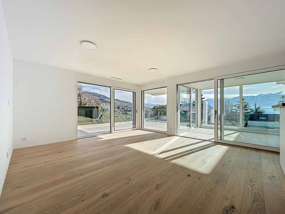 Appartement neuf de 145 m2 avec belle vue sur le lac - Bild 1