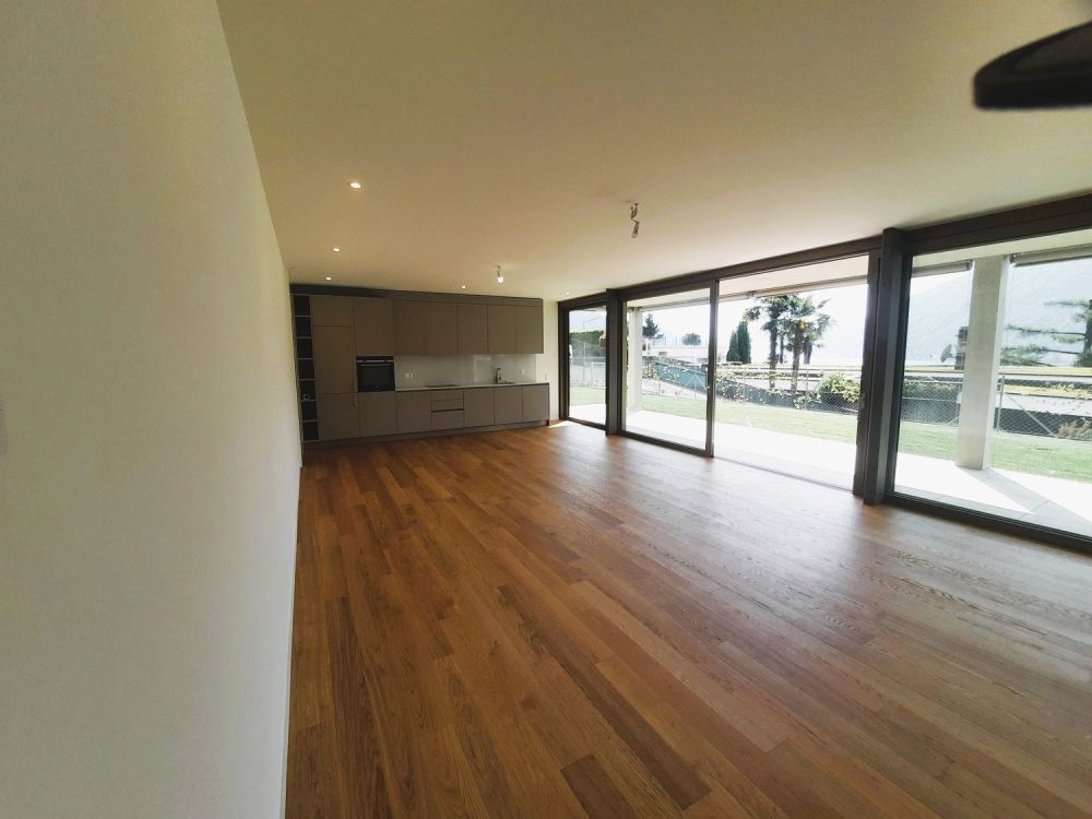 NUOVO APPARTAMENTO 2.5 LOCALI, AMPIO GIARDINO E VISTA LAGO -  Bild 5