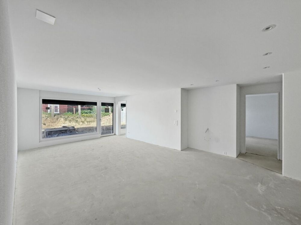Stadt trifft Natur - Traumwohnung in Rheinnähe - der offene Bereich Wohnen / Essen mit direktem Gartenzugang