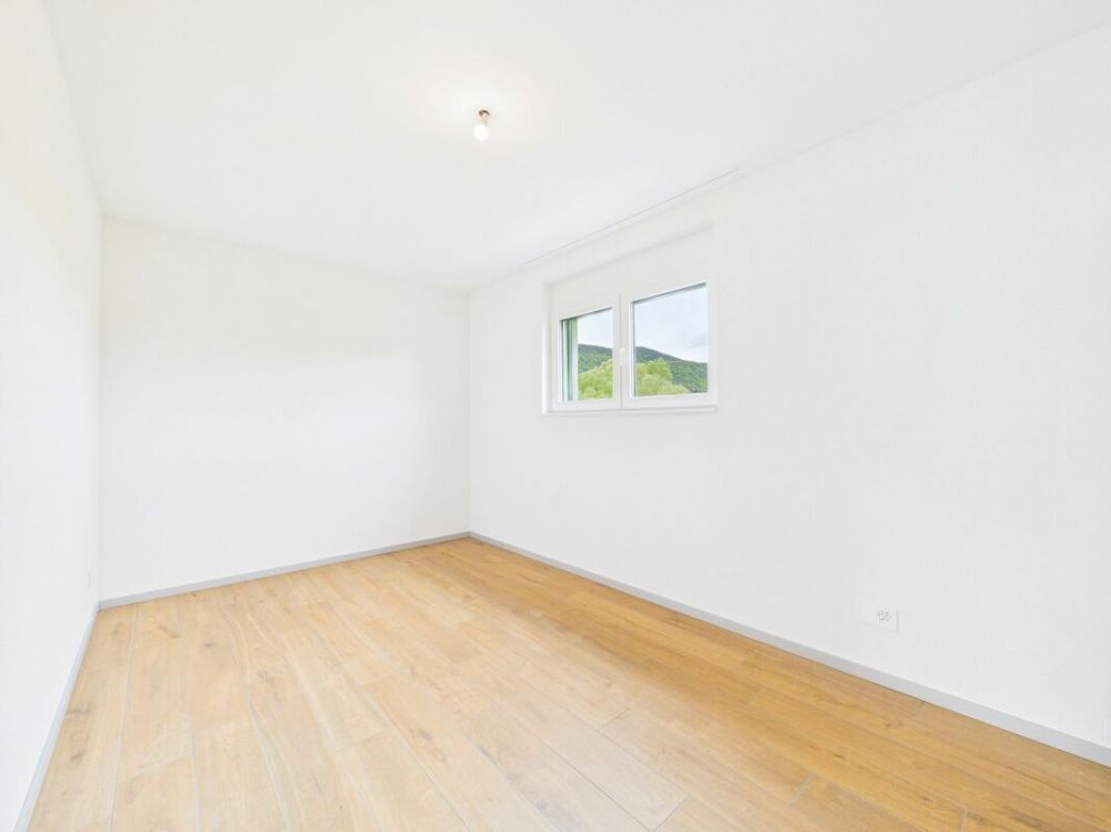 Stilvolle Attikawohnung mit grosser Terrasse und exklusiver Wohnkomfort in Delémont - Schlafzimmer
