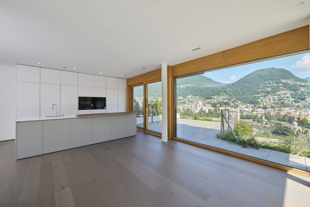 Attico in vendita a Lugano con Terrazza, Giardino e Vista Lago - Bild 1