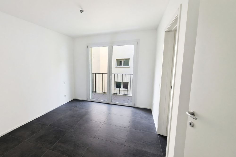 Nuovo appartamento 3,5 con terrazza coperta e due balconi -  Bild 10