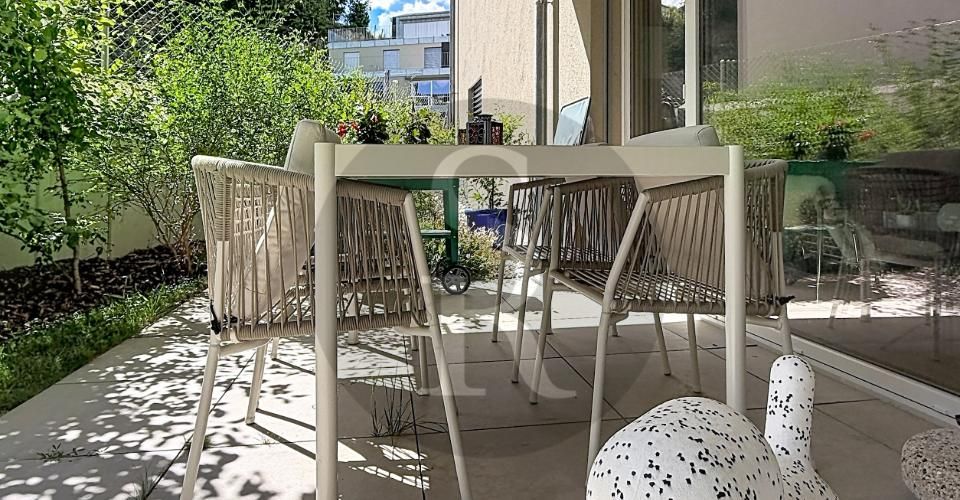Un écrin contemporain avec jardin privatif - Appartement 2.5 pièces - image - 1