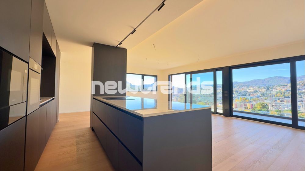 Viganello: 4,5 locali nuovi con vista aperta e parziale lago. - dettagli cucina