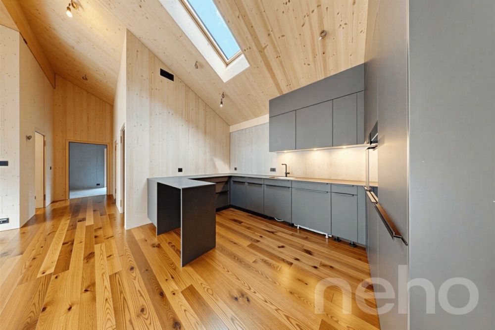 Neubau-Dachgeschosswohnung mit besonderer Architektur und Bergsicht -  Bild 5