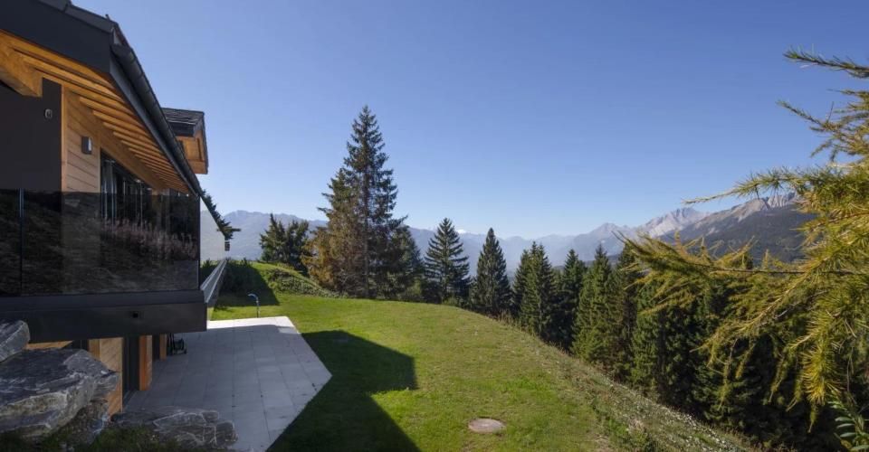 Chalet d'exception 5.5 pièces à Crans-Montana ? Vue imprenable et jacu - Chalet 5.5 pièces - image - 1