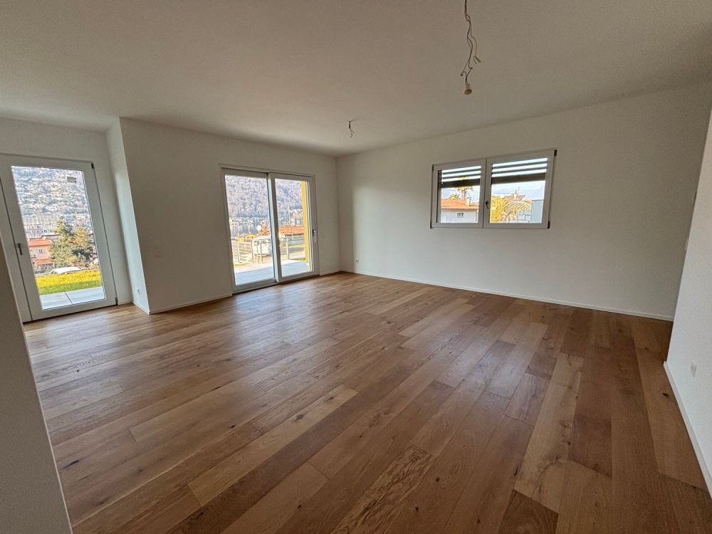 Neues Penthouse in Brusino - Seesicht und Bootsplatz! -  Bild 2