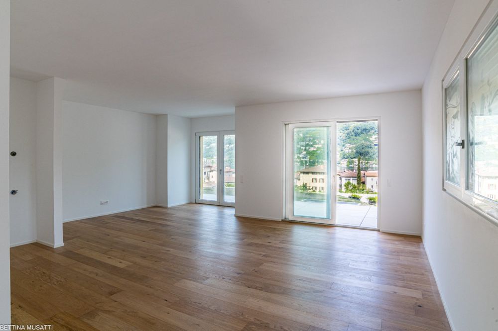BRUSINO ARSIZIO – WOHNUNG MIT PRIVATGARTEN UND SEEBLICK, KOMFORT UND NATUR IN REICHWEITE -  Bild 1