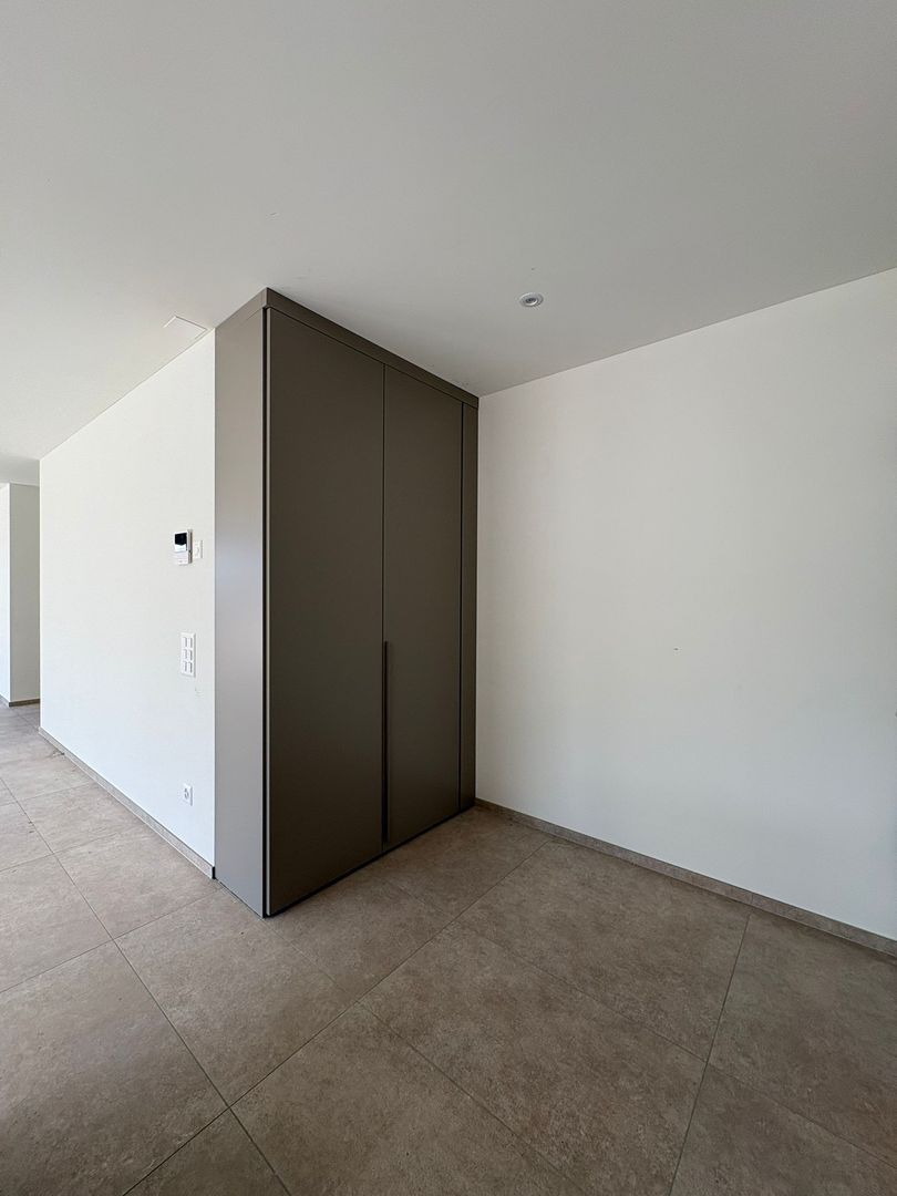 Moderno appartamento di 3.5 locali con ampia terrazza a Giubiasco -  Bild 7