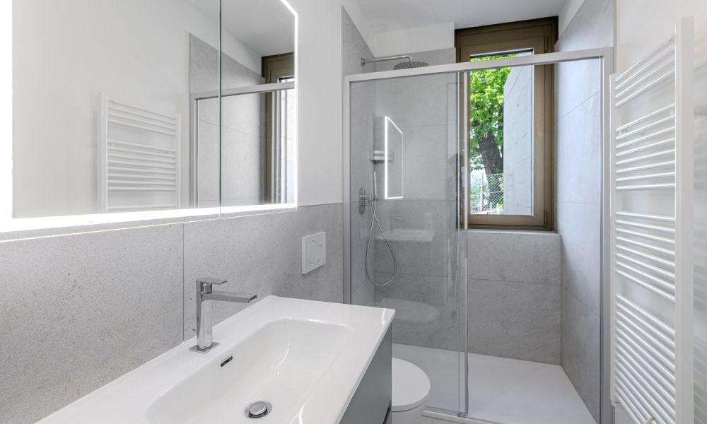 STUPENDO E MODERNO 2.5 CON GIARDINO E VISTA LAGO A BISSONE -  Bild 7