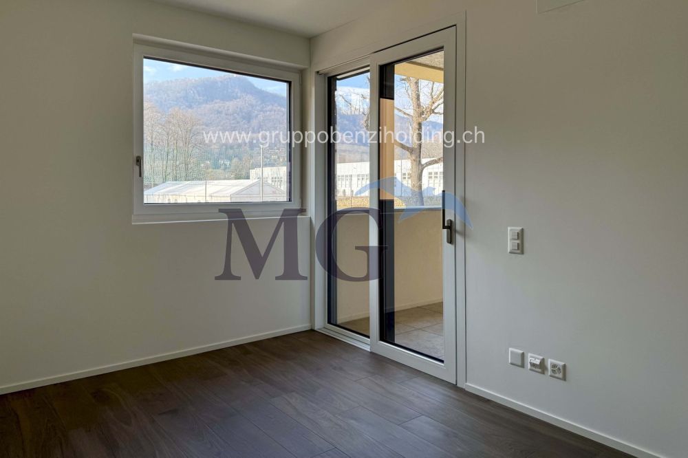 Moderno appartamento di 2.5 locali in zona residenziale - Bild 9